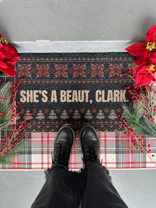 She’s a Beaut, Clark Doormat