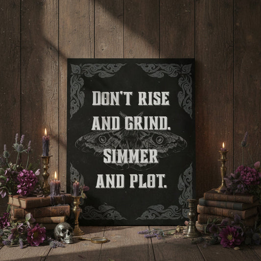 Decorative poster with a quote on a wooden wall with candles and books.